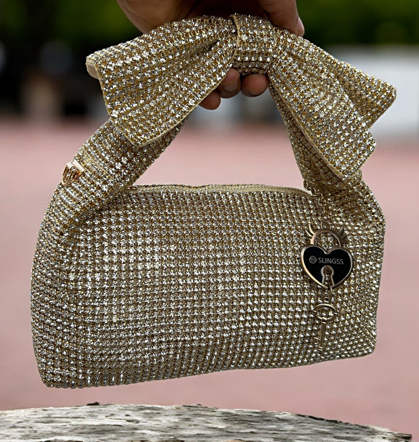 Slingss Luxury Range Exclusive Diamond Studded Partywear Bow Shaped Handle Bag For Ladies With Long Chain