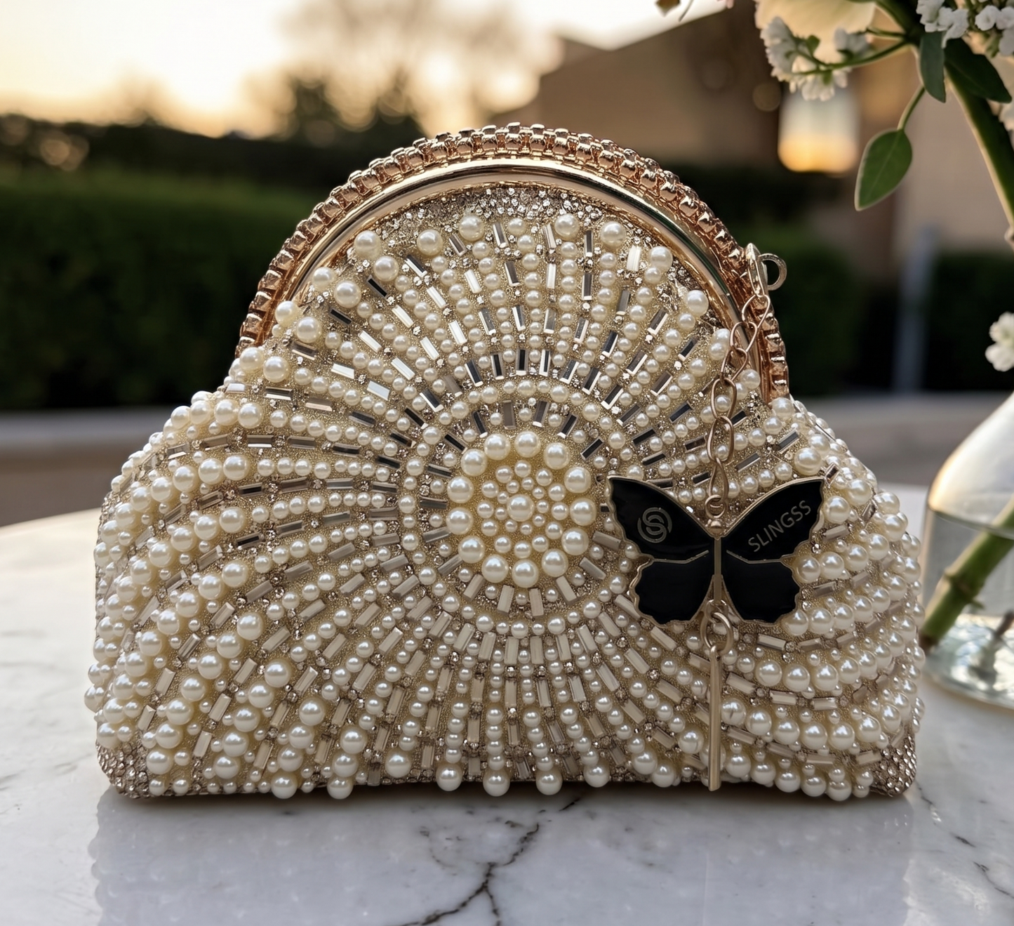Slingss Luxury Range Snail Shape Pearl Partywear Handbag For Ladies With Long Chain
