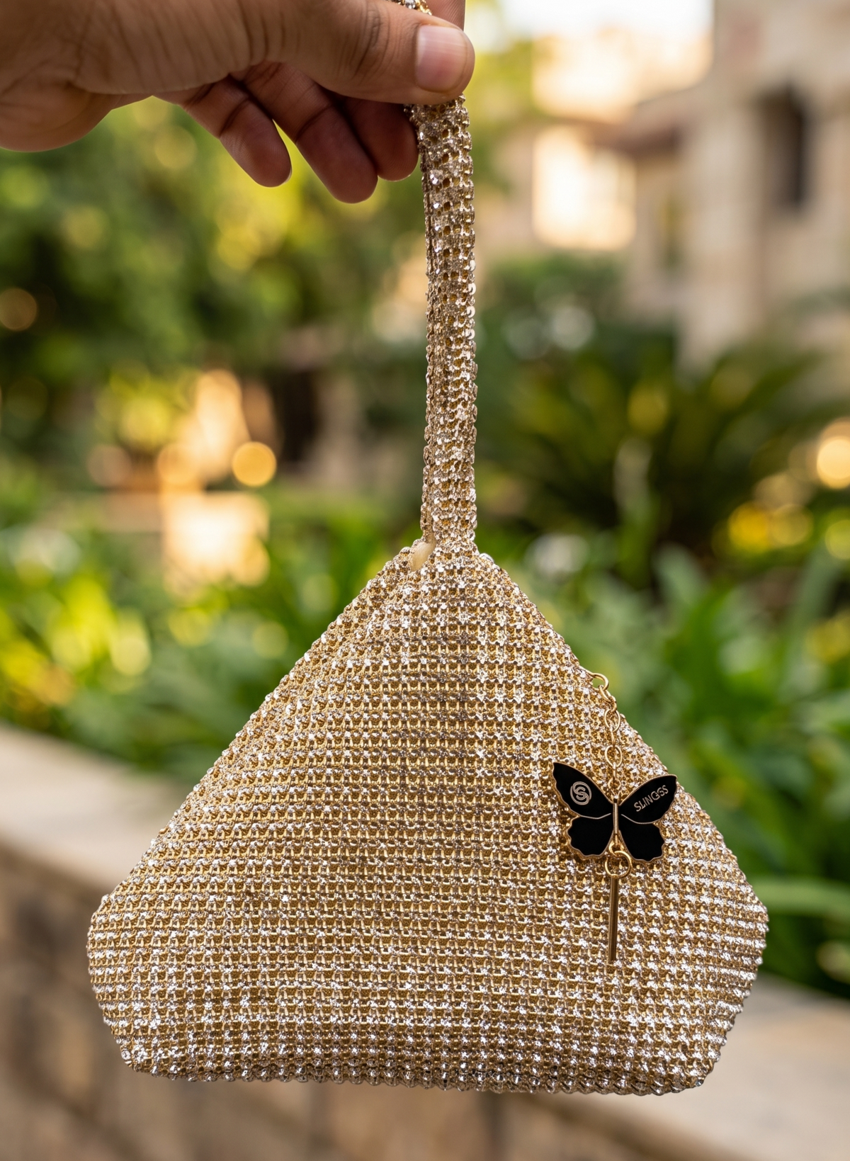Slingss Luxury Range Exclusive Diamond Studded Partywear Samosa Shaped Potli bag For Ladies