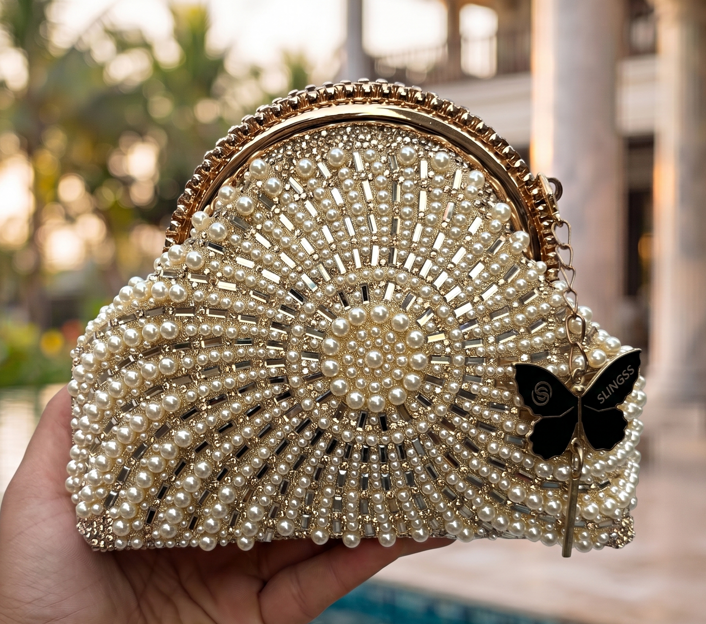 Slingss Luxury Range Snail Shape Pearl Partywear Handbag For Ladies With Long Chain