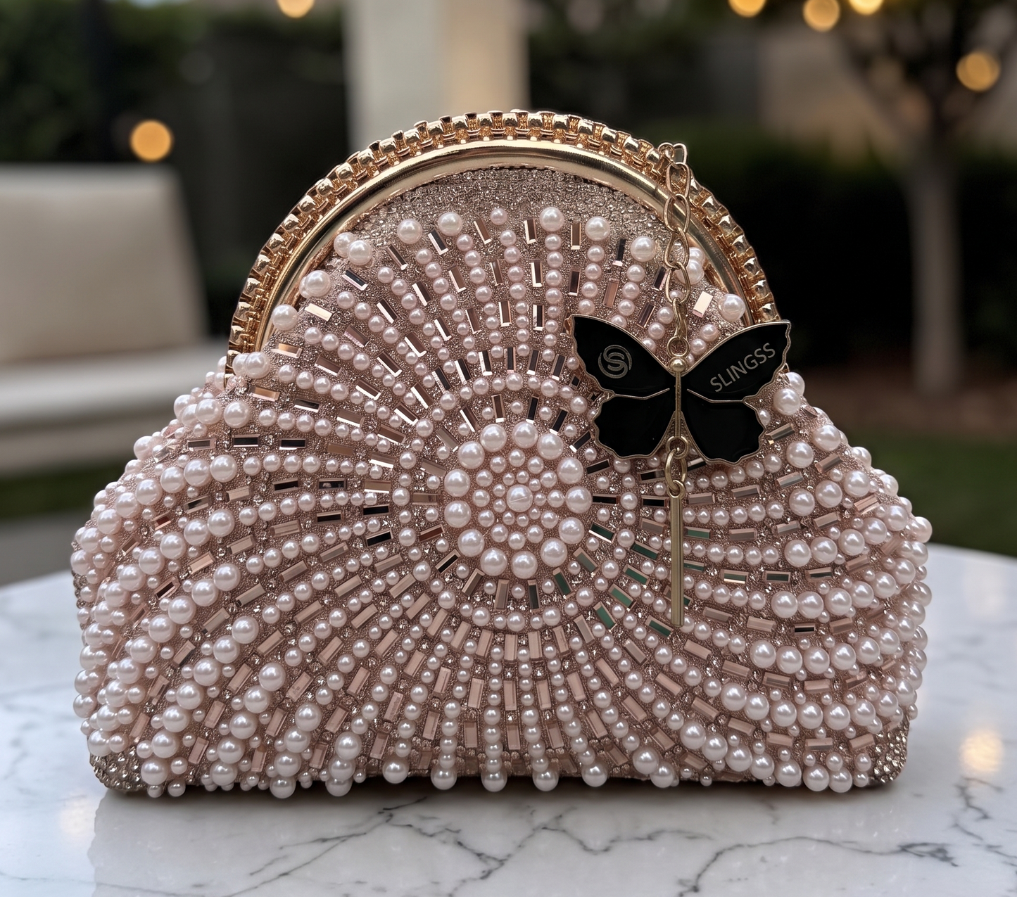 Slingss Luxury Range Snail Shape Pearl Partywear Handbag For Ladies With Long Chain