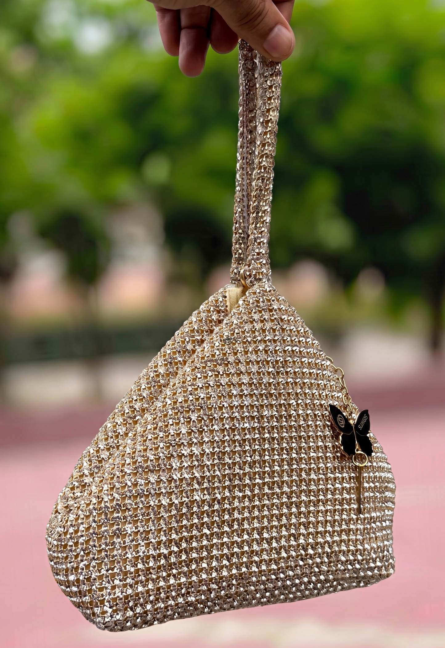 Slingss Luxury Range Exclusive Diamond Studded Partywear Samosa Shaped Potli bag For Ladies