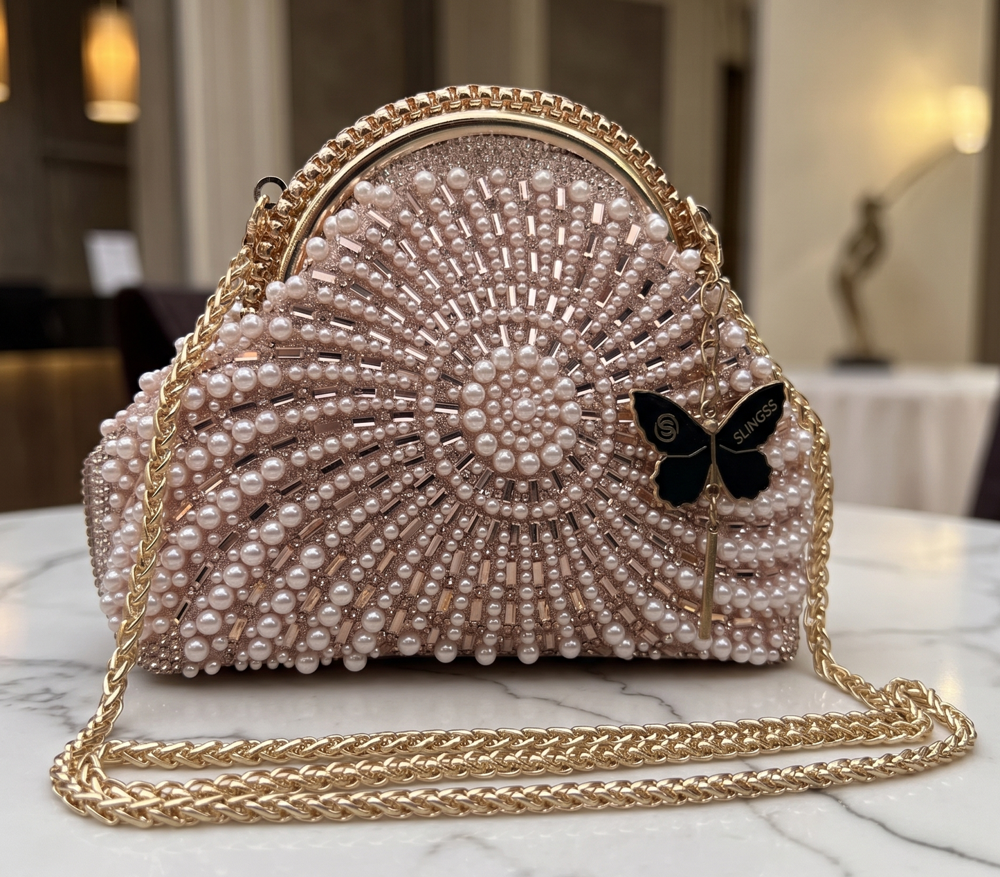 Slingss Luxury Range Snail Shape Pearl Partywear Handbag For Ladies With Long Chain
