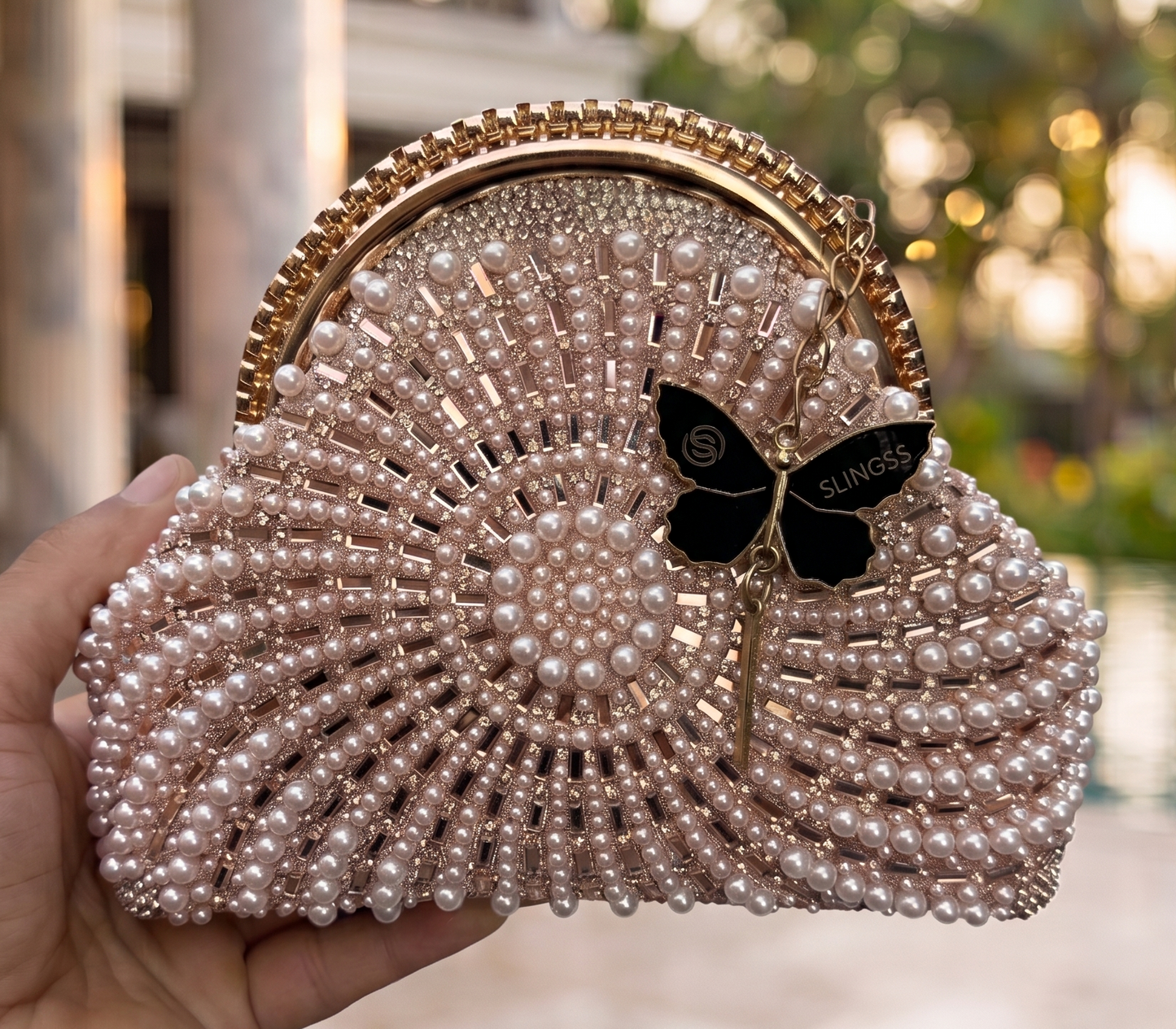 Slingss Luxury Range Snail Shape Pearl Partywear Handbag For Ladies With Long Chain