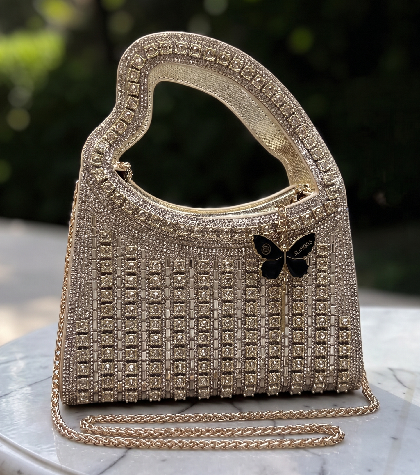 Slingss Luxury Range Heart Shape Handle Partywear Handbag For Ladies With Long Chain