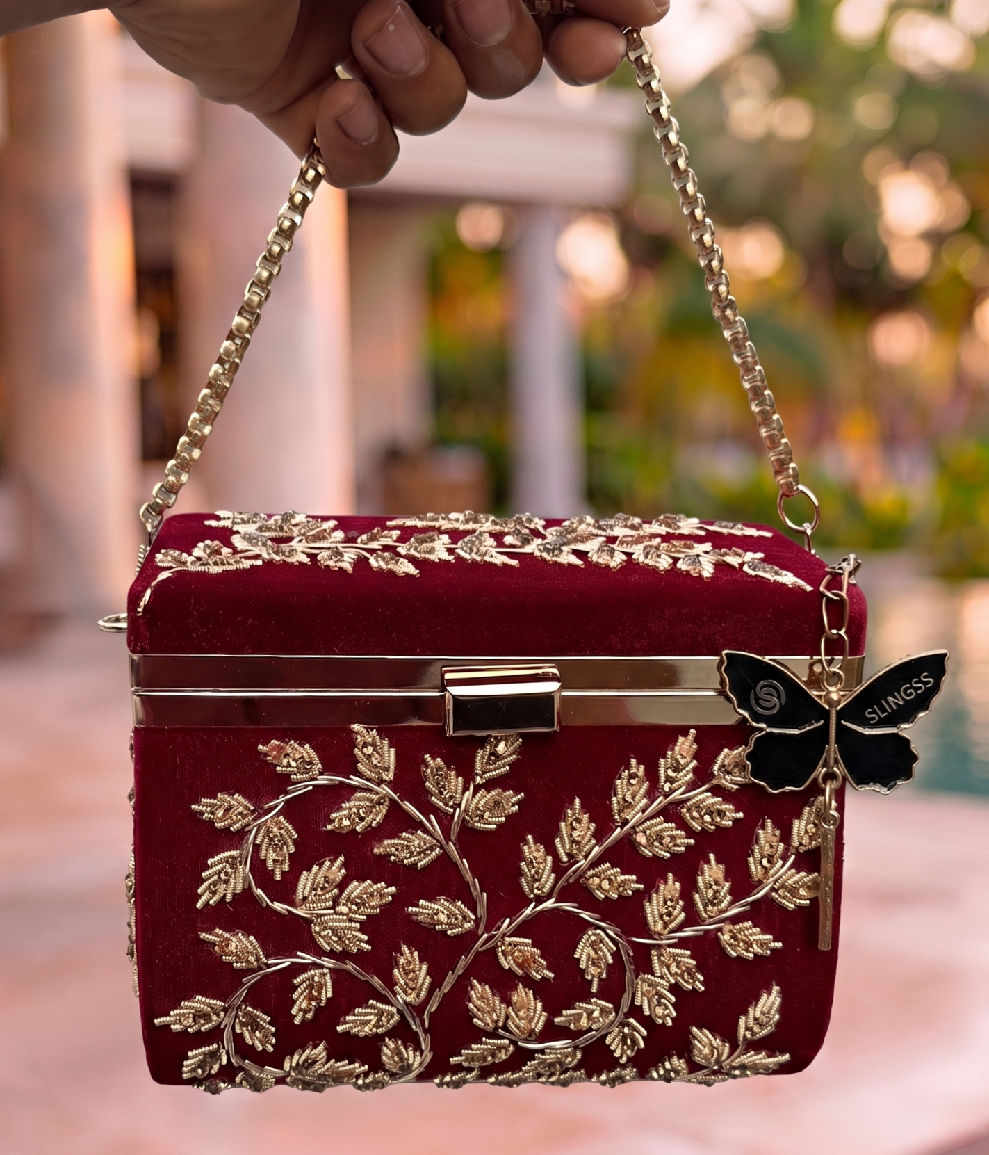 Slingss Luxury Range Boxy Embroidered Partywear Handbag For Ladies With Chain Handle And Belt