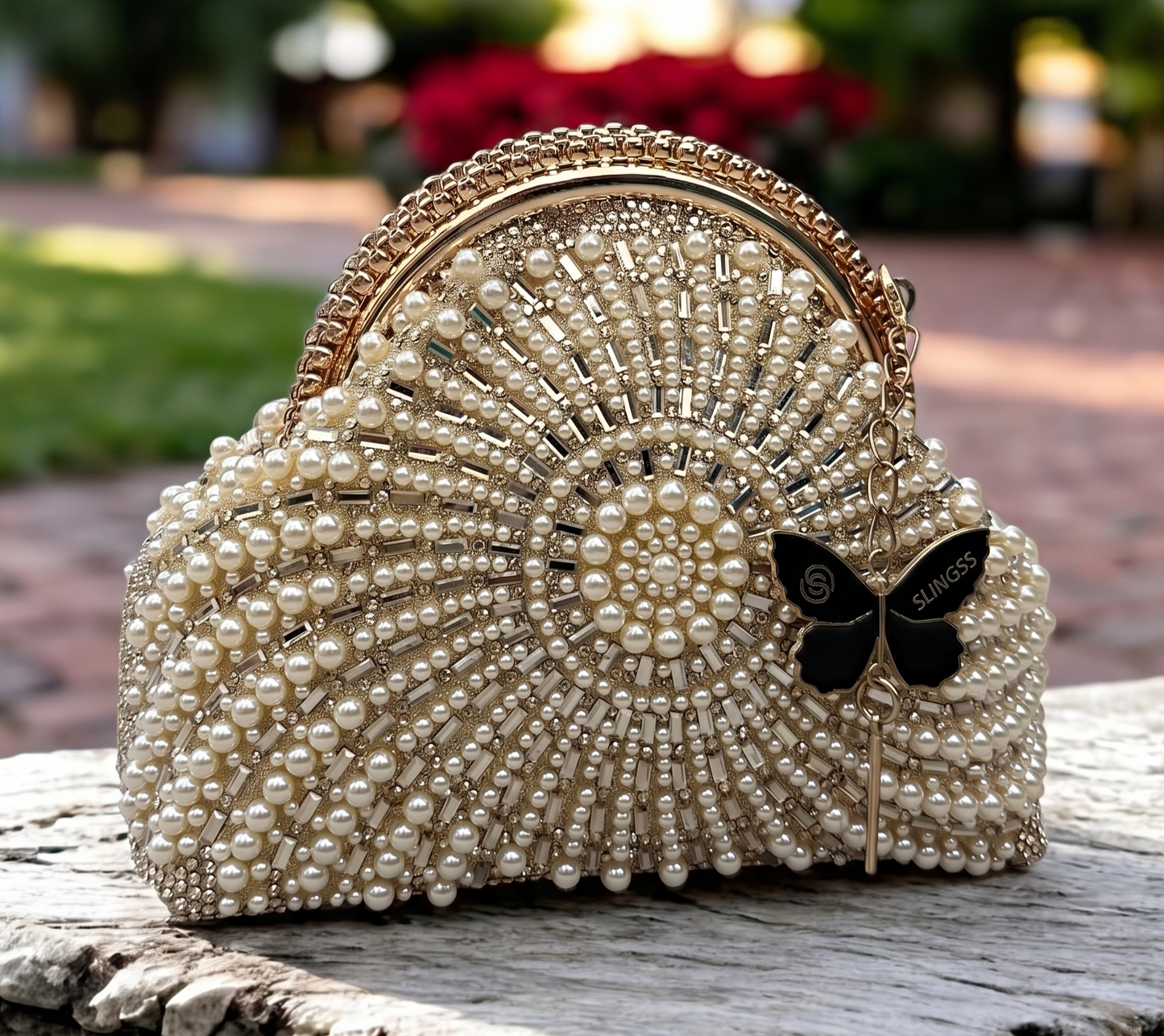 Slingss Luxury Range Snail Shape Pearl Partywear Handbag For Ladies With Long Chain