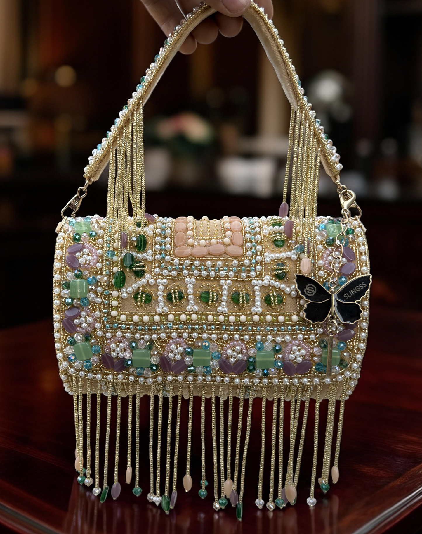 Slingss Luxury Range Hanging Beads Embroidered Partywear Handbag For Ladies With Handle