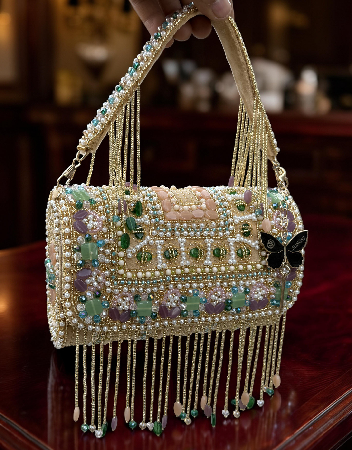 Slingss Luxury Range Hanging Beads Embroidered Partywear Handbag For Ladies With Handle