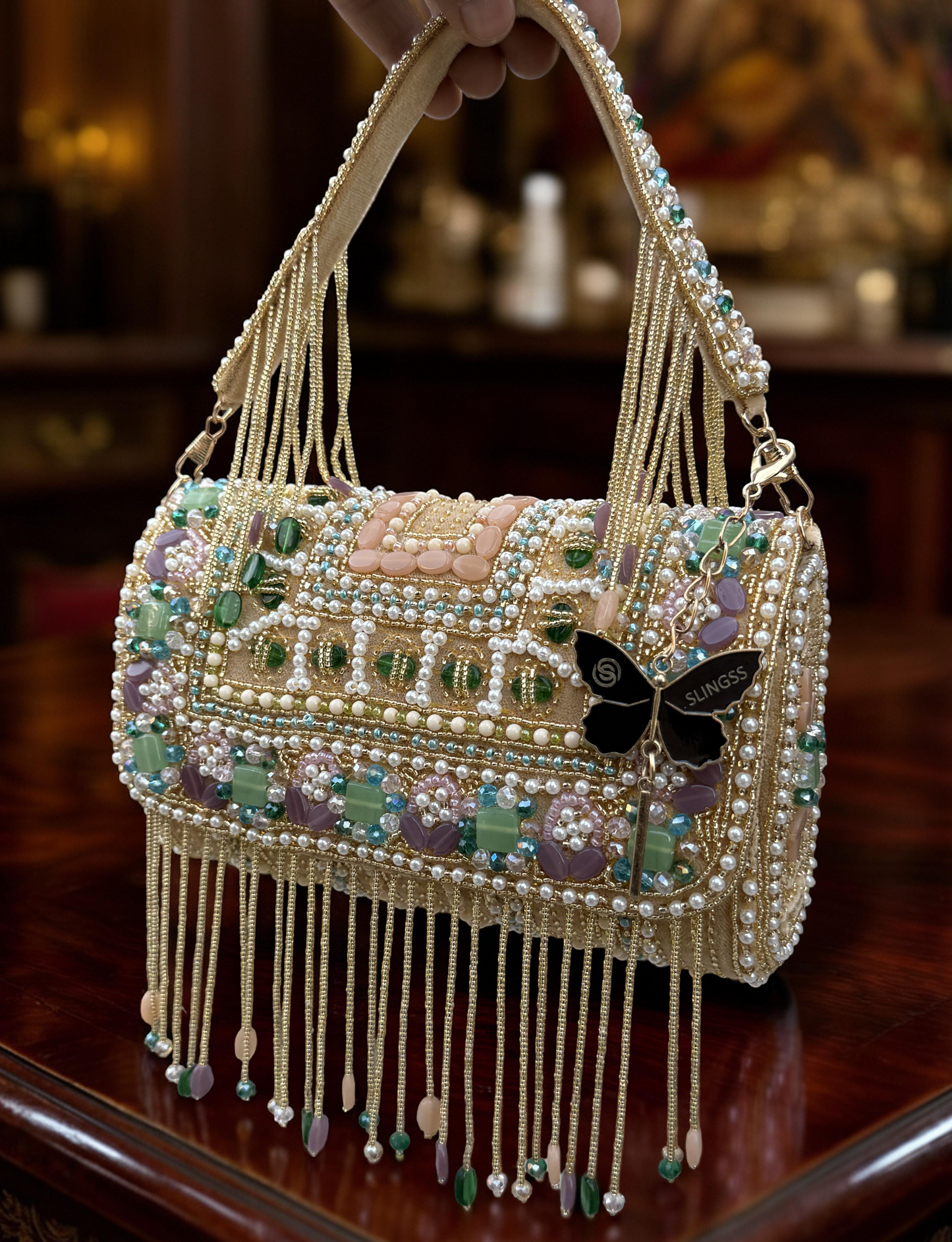 Slingss Luxury Range Hanging Beads Embroidered Partywear Handbag For Ladies With Handle