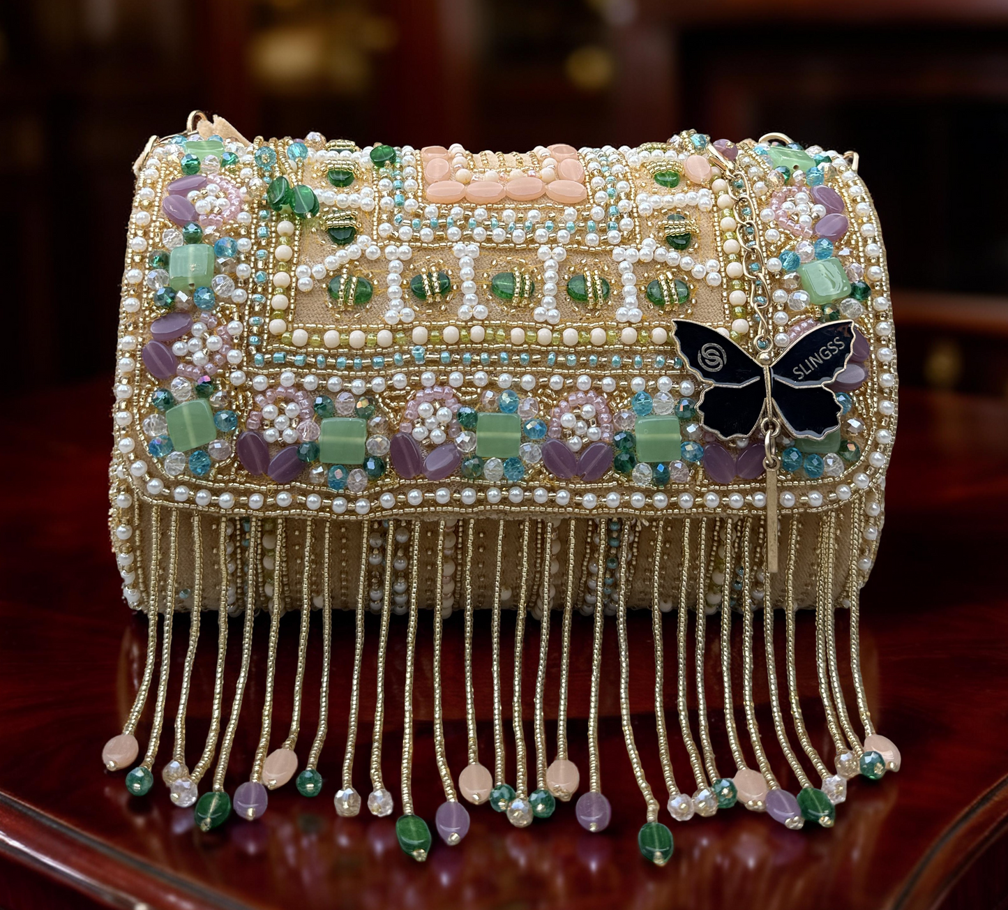 Slingss Luxury Range Hanging Beads Embroidered Partywear Handbag For Ladies With Handle
