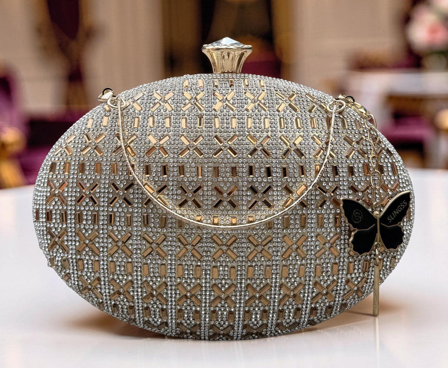 Slingss Exclusive Premium Oval Shape Partywear Embroidered Clutch For Ladies With Golden Handle & Chain