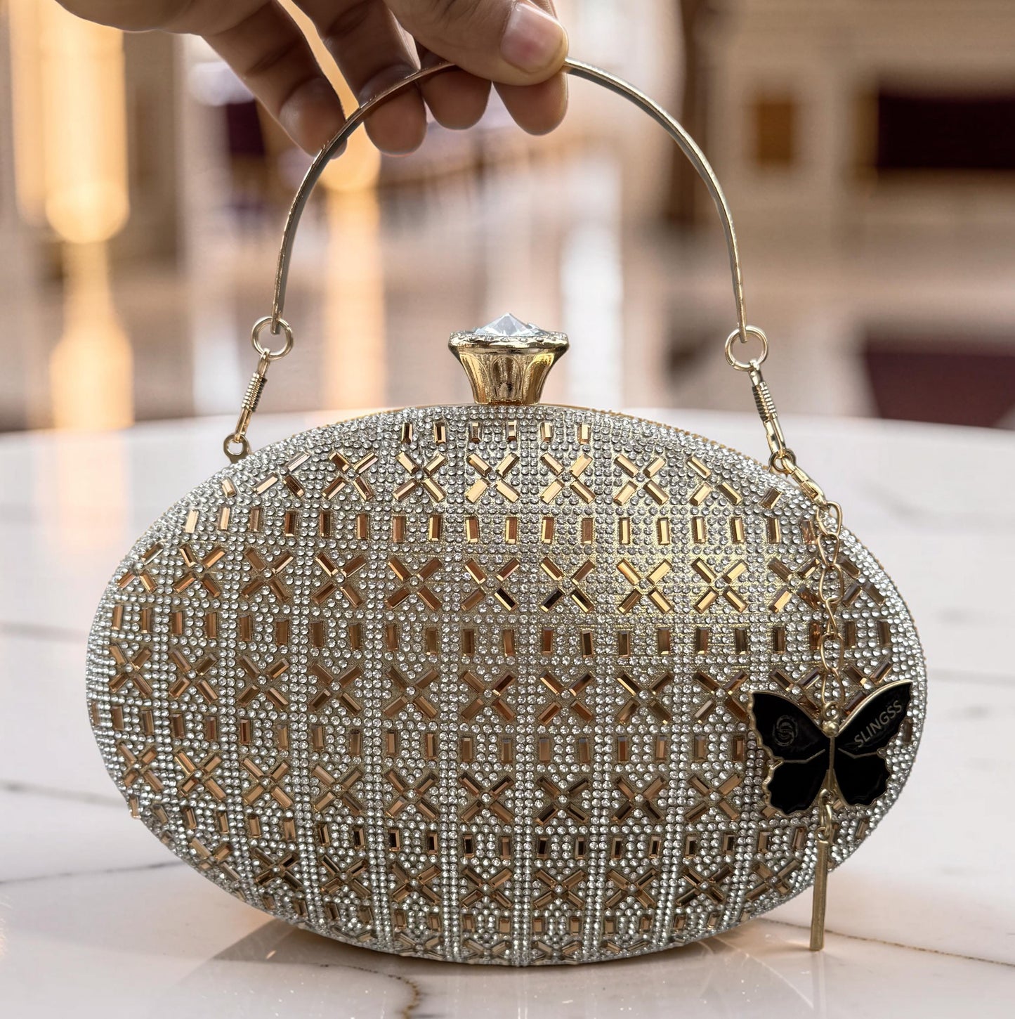 Slingss Exclusive Premium Oval Shape Partywear Embroidered Clutch For Ladies With Golden Handle & Chain