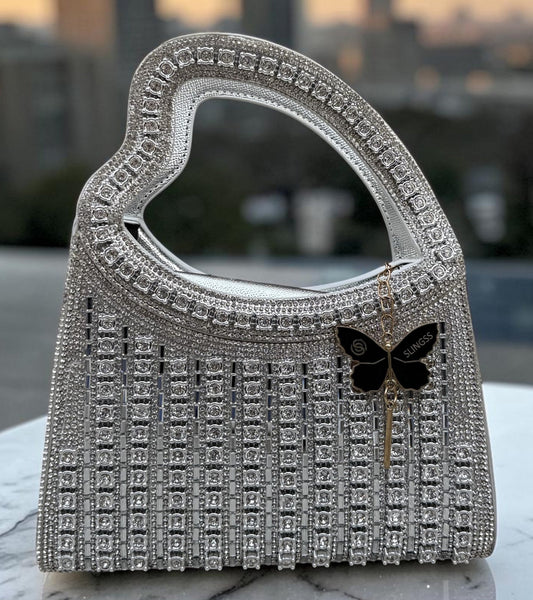 Slingss Luxury Range Heart Shape Handle Partywear Handbag For Ladies With Long Chain