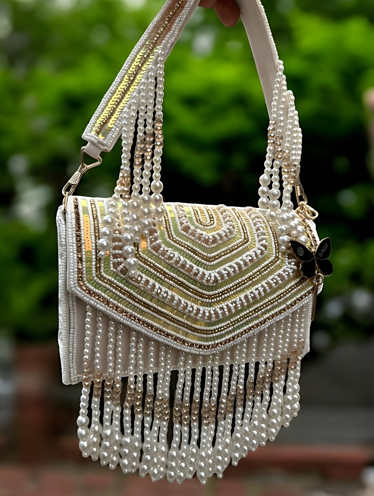 Slingss Luxury Range Hanging Beads Embroidered Partywear Handbag For Ladies With Handle