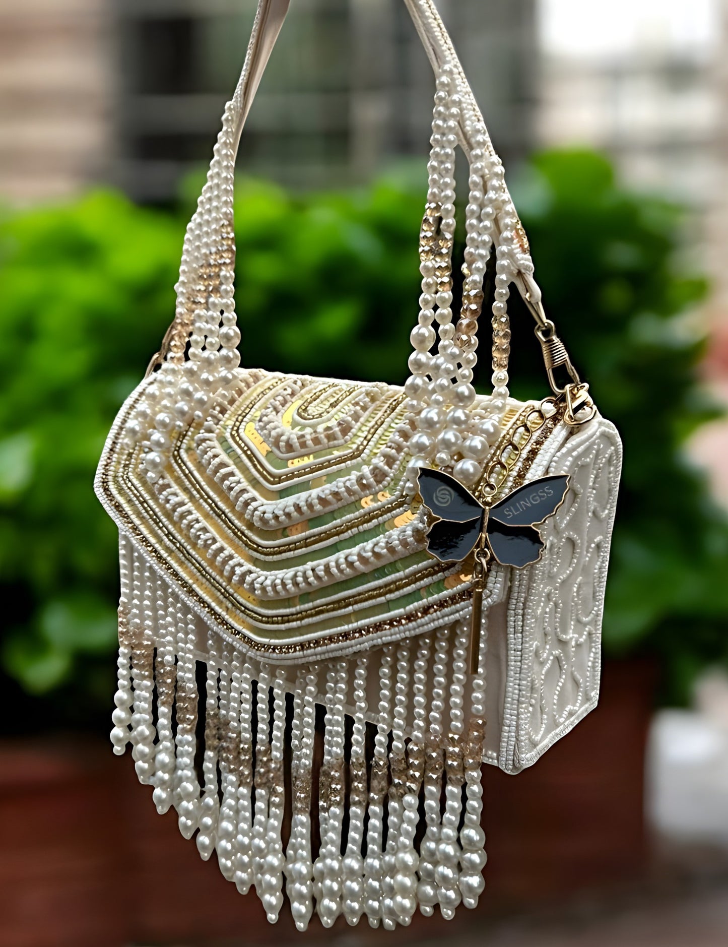 Slingss Luxury Range Hanging Beads Embroidered Partywear Handbag For Ladies With Handle