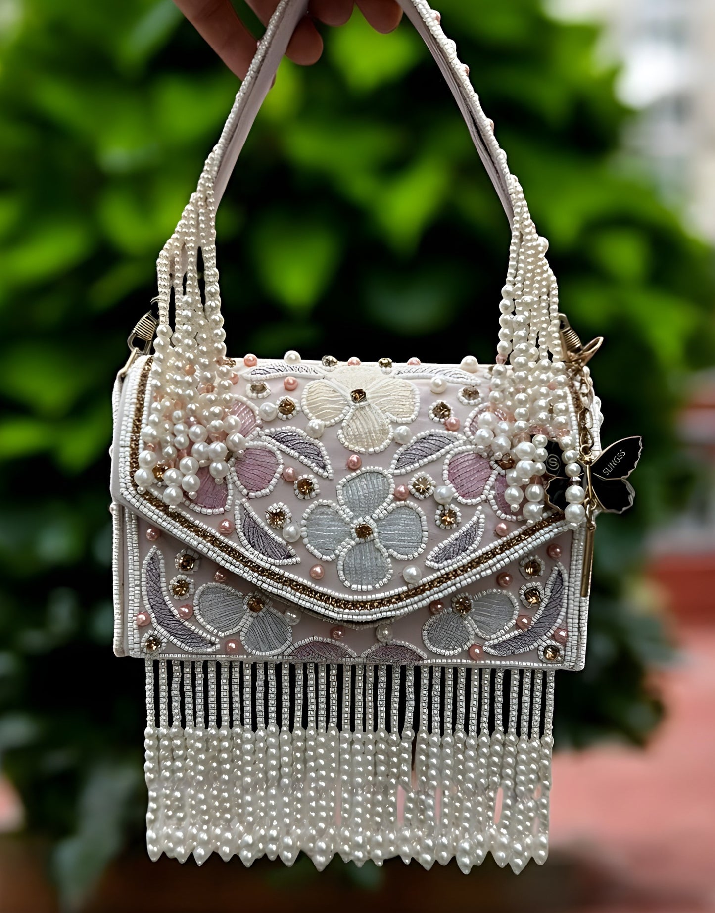 Slingss Luxury Range Hanging Beads Embroidered Partywear Handbag For Ladies With Handle