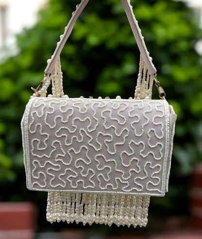 Slingss Luxury Range Hanging Beads Embroidered Partywear Handbag For Ladies With Handle