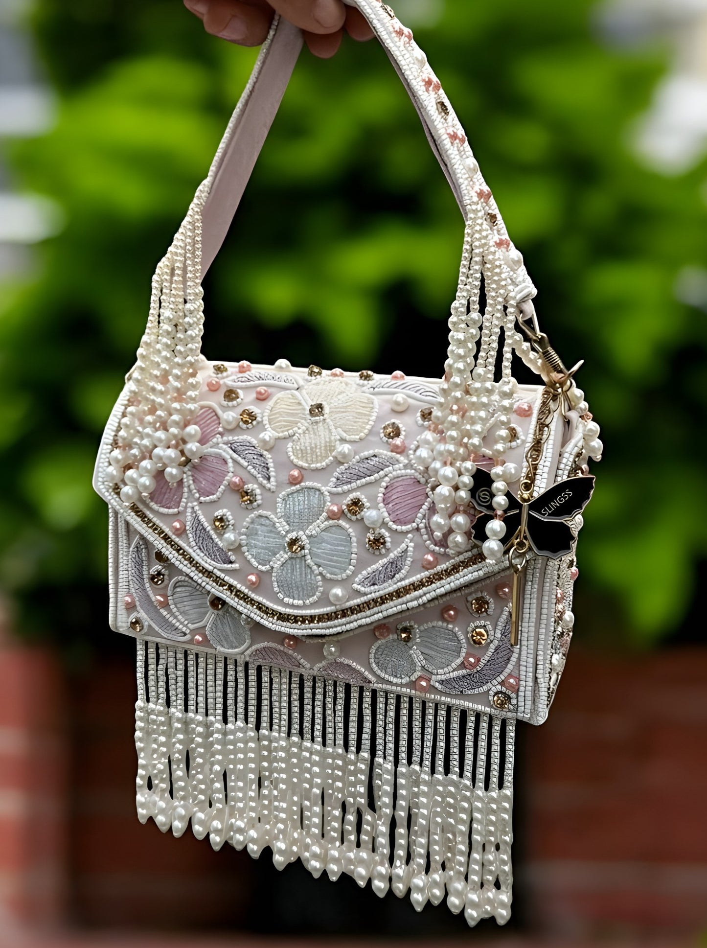 Slingss Luxury Range Hanging Beads Embroidered Partywear Handbag For Ladies With Handle