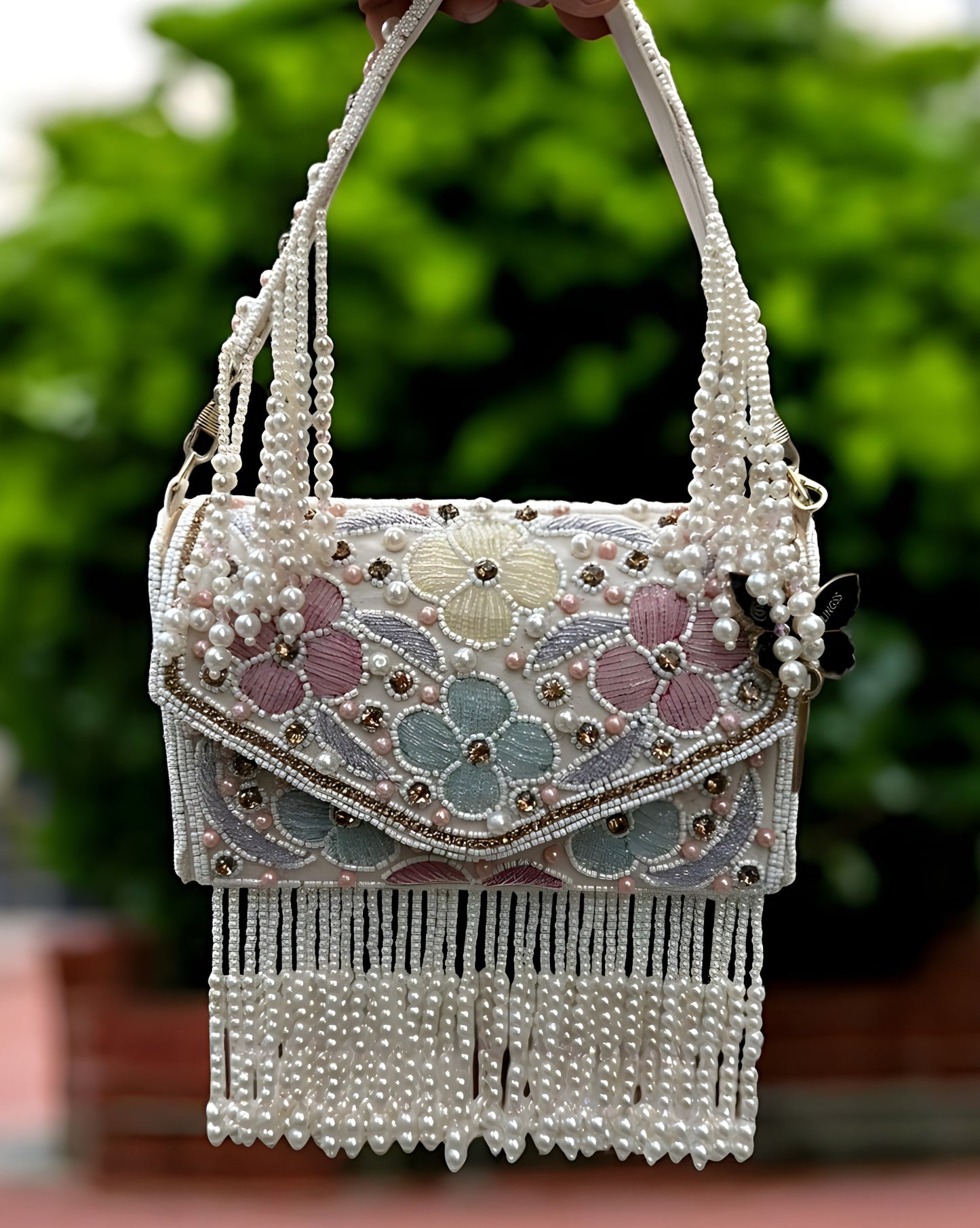 Slingss Luxury Range Hanging Beads Embroidered Partywear Handbag For Ladies With Handle