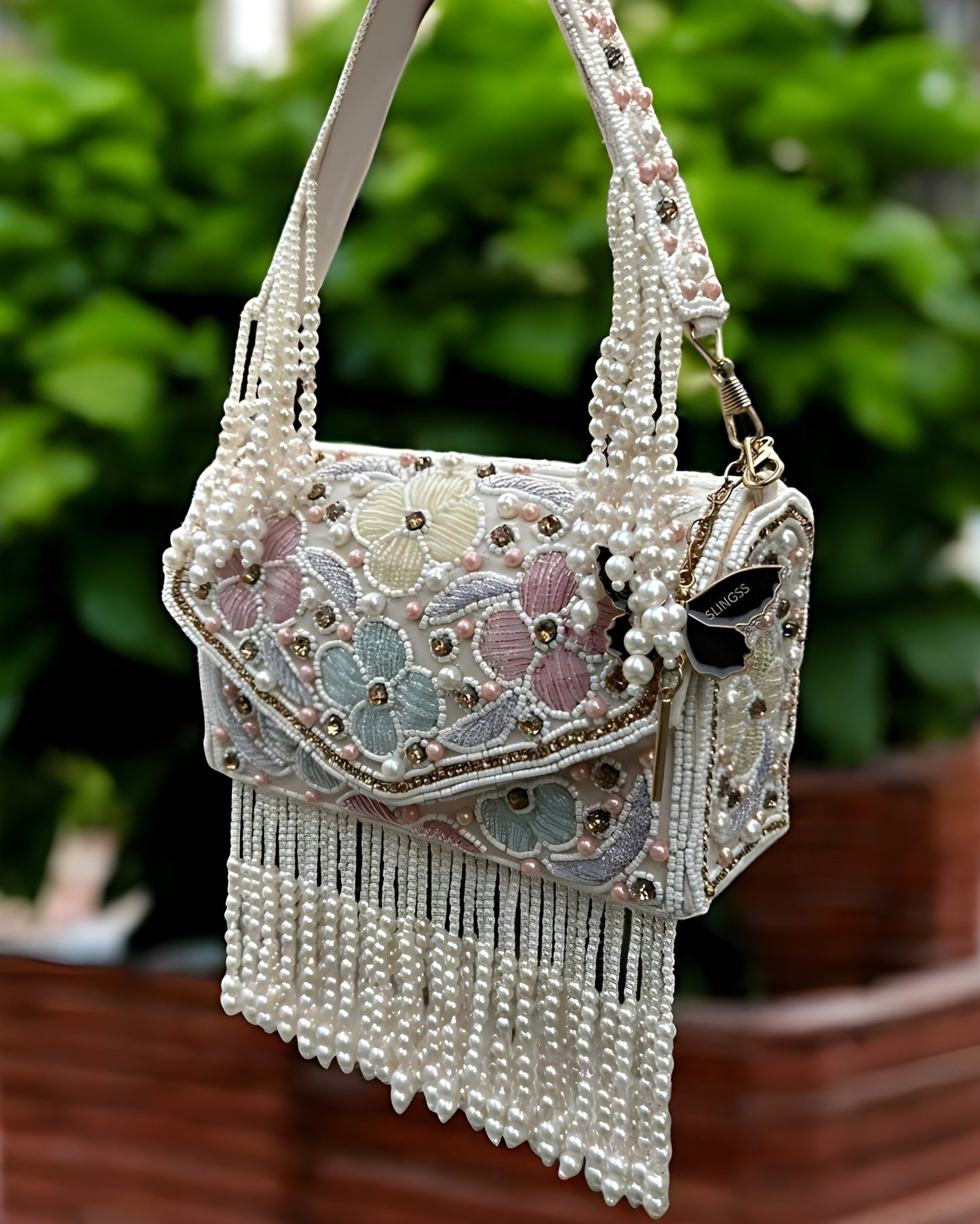 Slingss Luxury Range Hanging Beads Embroidered Partywear Handbag For Ladies With Handle