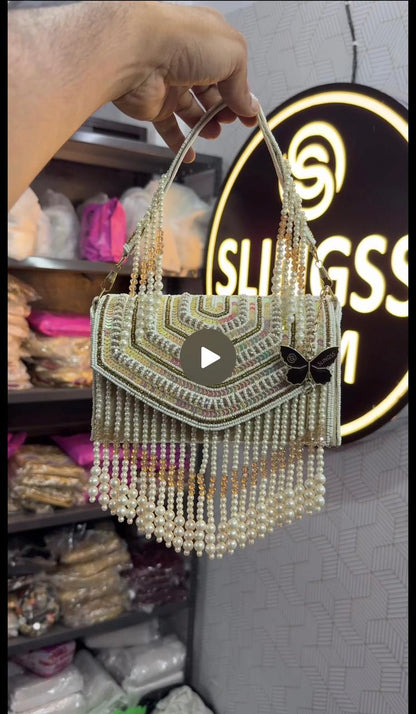 Slingss Luxury Range Hanging Beads Embroidered Partywear Handbag For Ladies With Handle