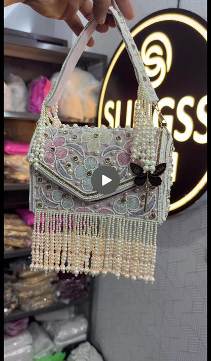 Slingss Luxury Range Hanging Beads Embroidered Partywear Handbag For Ladies With Handle