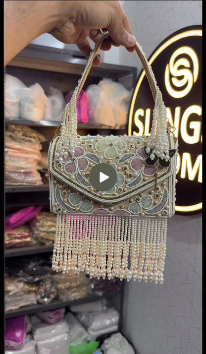 Slingss Luxury Range Hanging Beads Embroidered Partywear Handbag For Ladies With Handle