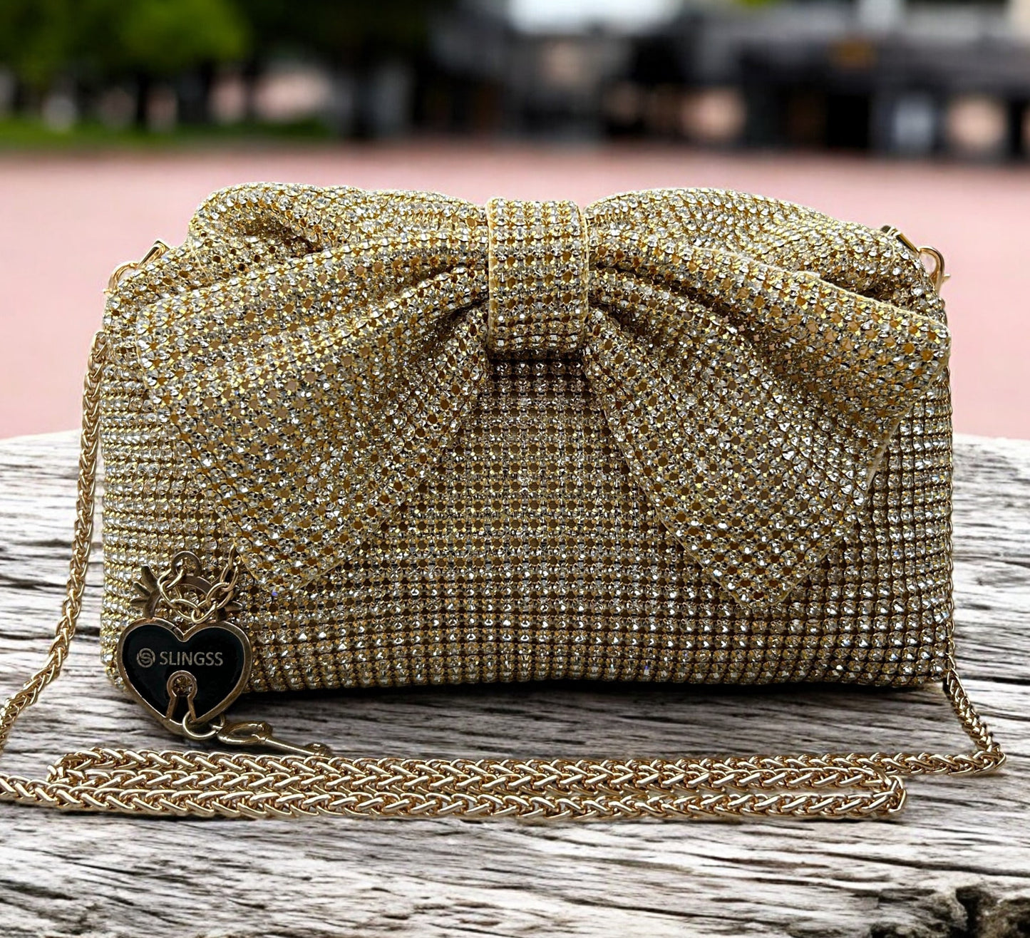 Slingss Luxury Range Exclusive Diamond Studded Partywear Bow Shaped Handle Bag For Ladies With Long Chain