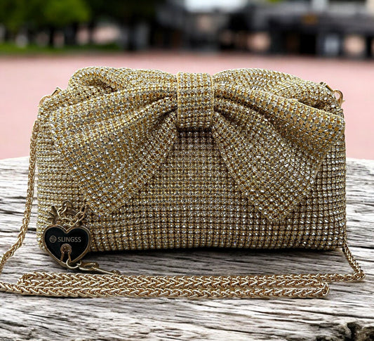 Slingss Luxury Range Exclusive Diamond Studded Partywear Bow Shaped Handle Bag For Ladies With Long Chain